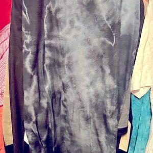 Muted navy/black marbled colored fabric skirt.